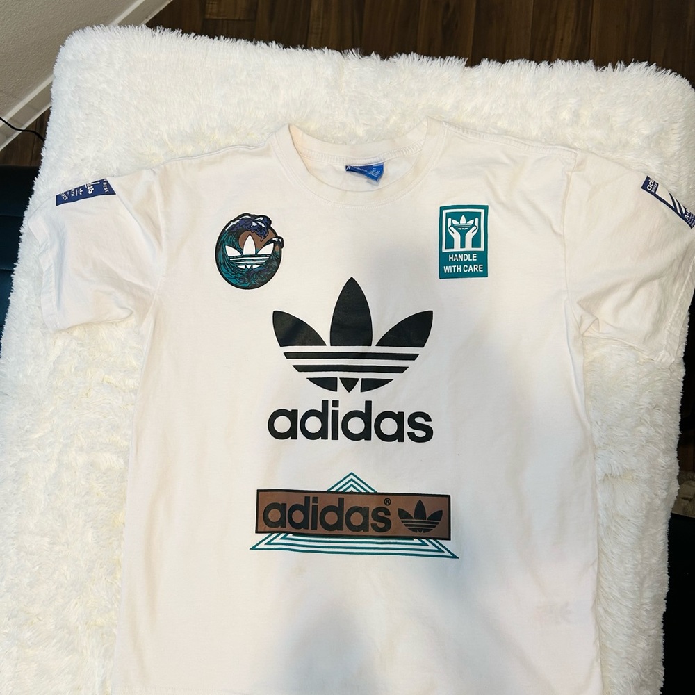Adidas Cream Tee with Blue Tag